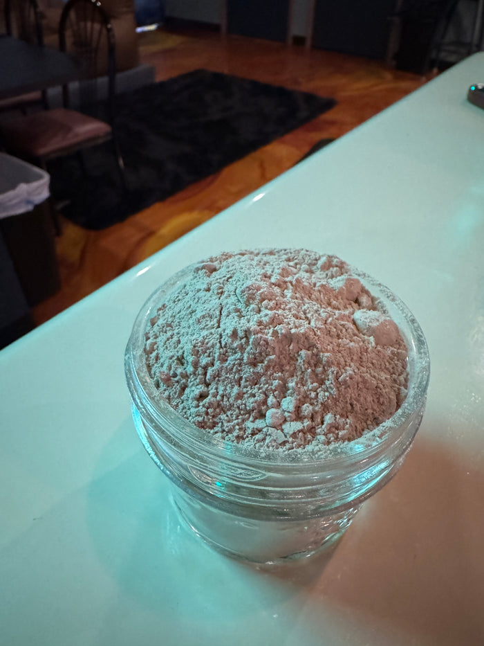 Ah'Koola Instant Kava powder in a glass jar
