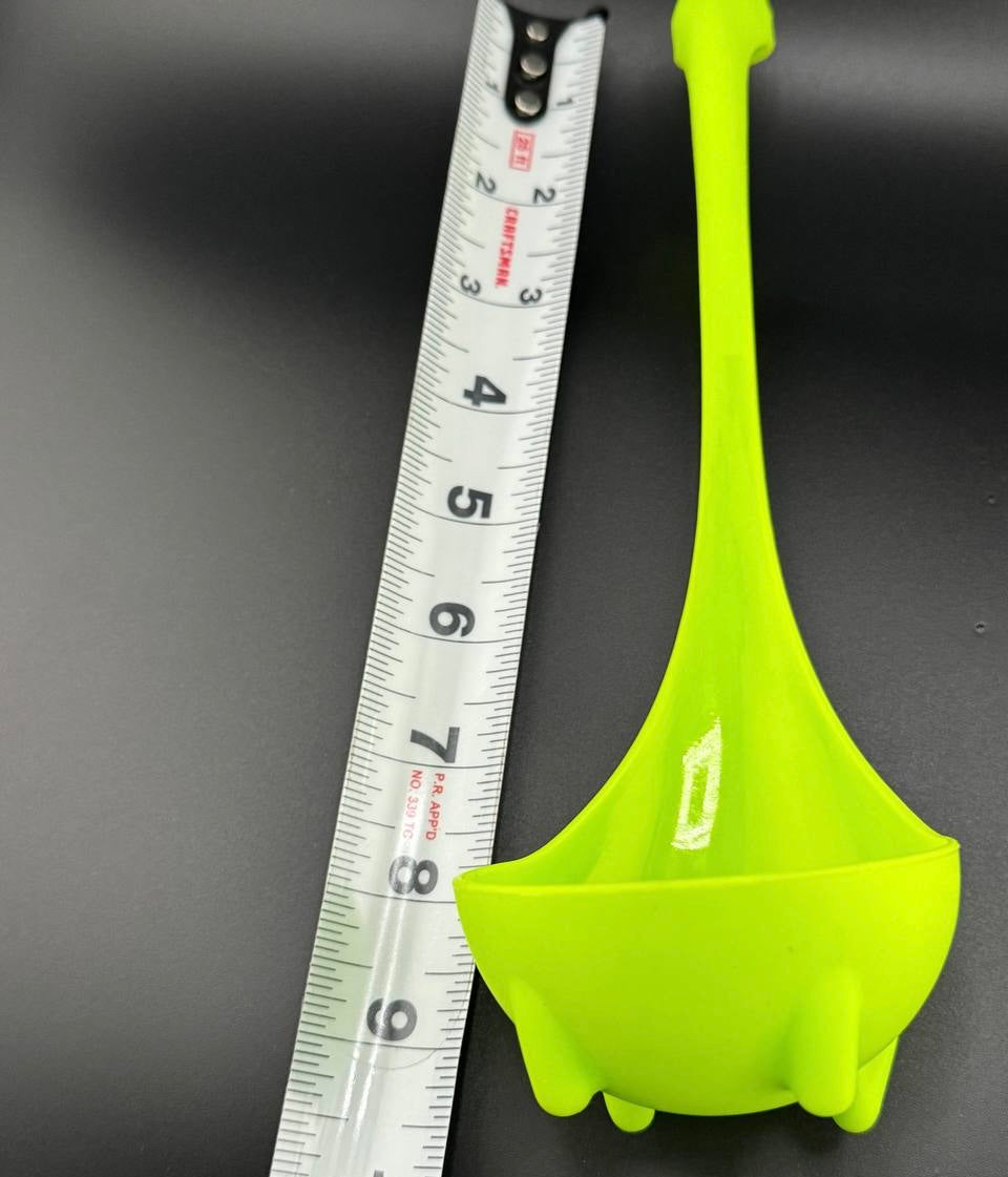 green plastic ladle